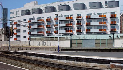 Full facade to Whitworth Street West. View from Oxford Road Station.